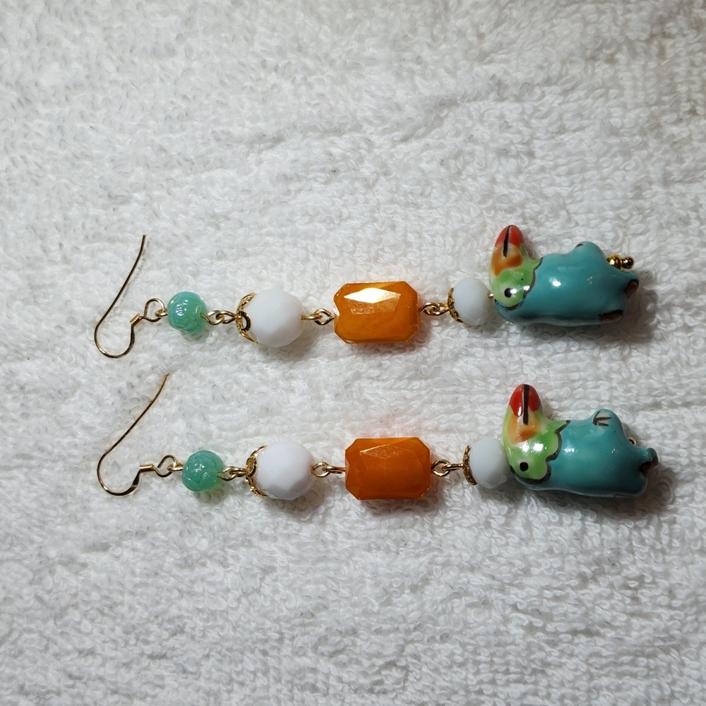 Turquoise parrot dangle earrings